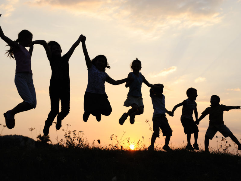 Silhouette, group of children playing